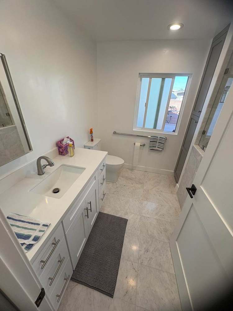 Photo 12 · Existing bathroom and fixture references