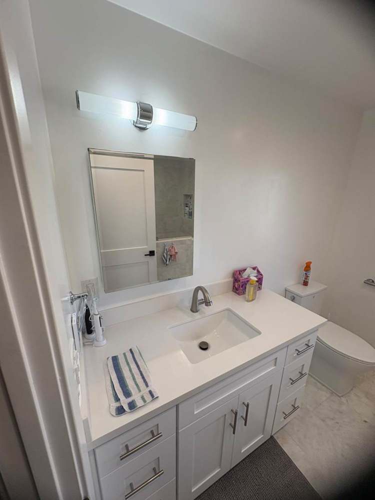 Photo 13 · Existing bathroom and fixture references