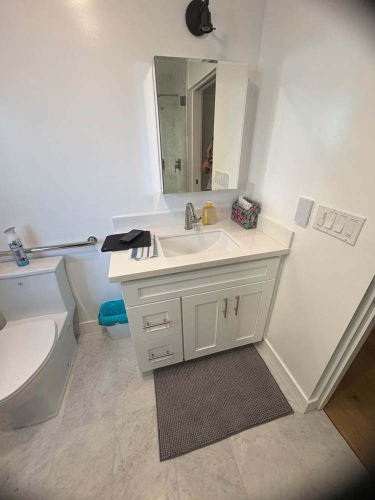 Photo 22 · Existing bathroom and fixture references