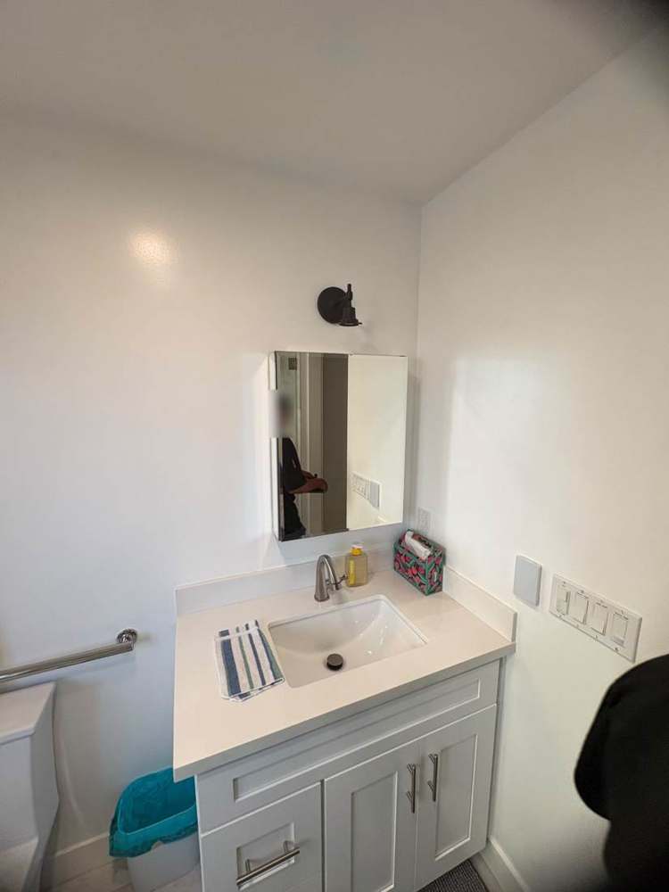 Photo 23 · Existing bathroom and fixture references