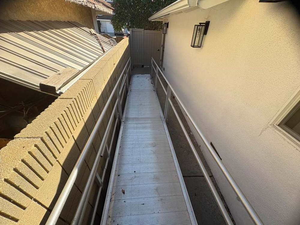 Photo 29 · Laundry utilities and exterior deck